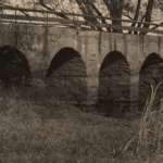 FOUR ARCHES– The Four Arch Bridge over the Sudbury River on Old Sudbury Road, in a photo taken by Alfred Wayland Cutting between 1880 and 1930.